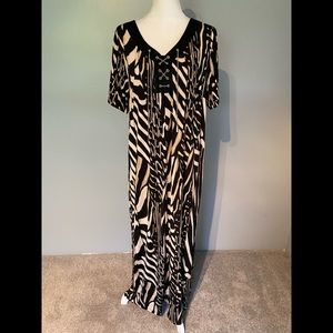 Catherine’s animal print dress with chain front detail